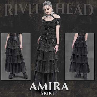 Model wearing the Amira Skirt—a long, black, tiered gothic skirt with frayed edges, chains, straps, and a corset-style waist.