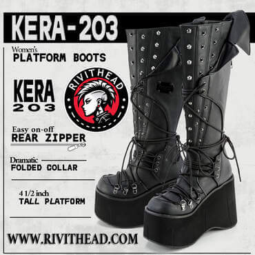Black KERA-203 knee-high platform boots with ribbed 4.5&quot; sole, silver cone studs, wraparound D-ring lacing, winged collar, and inner side zipper.