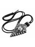 Capitaneus Necklace with textured arrowhead pendant, raised skull detail, and black cord