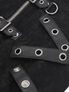 Close-up of the Badlands Strap Vest showing black straps with silver grommets and a zipper detail.
