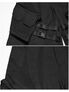 Black utility cargo shorts with flap pocket, buckle straps, and textured side panel.