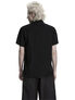 Back view of a black short sleeve shirt on a model with light blond hair
