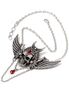 A silver necklace featuring a winged skull pendant with red accents and a chain design.