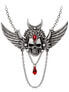 A silver winged skull necklace featuring red gemstones and intricate detailing.