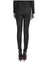 Back view of Kavita Faded Pants in black with subtle distressed texture, slim fit, ankle length