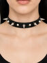 Black leather choker with silver spikes and studs on a model's neck