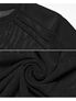 Black mesh shirt fabric close-up with ribbed texture and a rolled knit detail