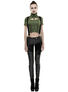 Front view of Nikita Detachable Pants in black with mixed fabric panels, straps, and metal hardware