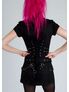 Back view of Rocka Zip Black Dress with corset lacing, grommets, and O-ring strap details