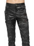 Front view of Shadow Infantry Pants in black with cargo pockets, zippers, and textured fabric details