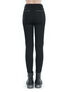 Back view of black Vivian harness pants with a slim fit and zipper details.