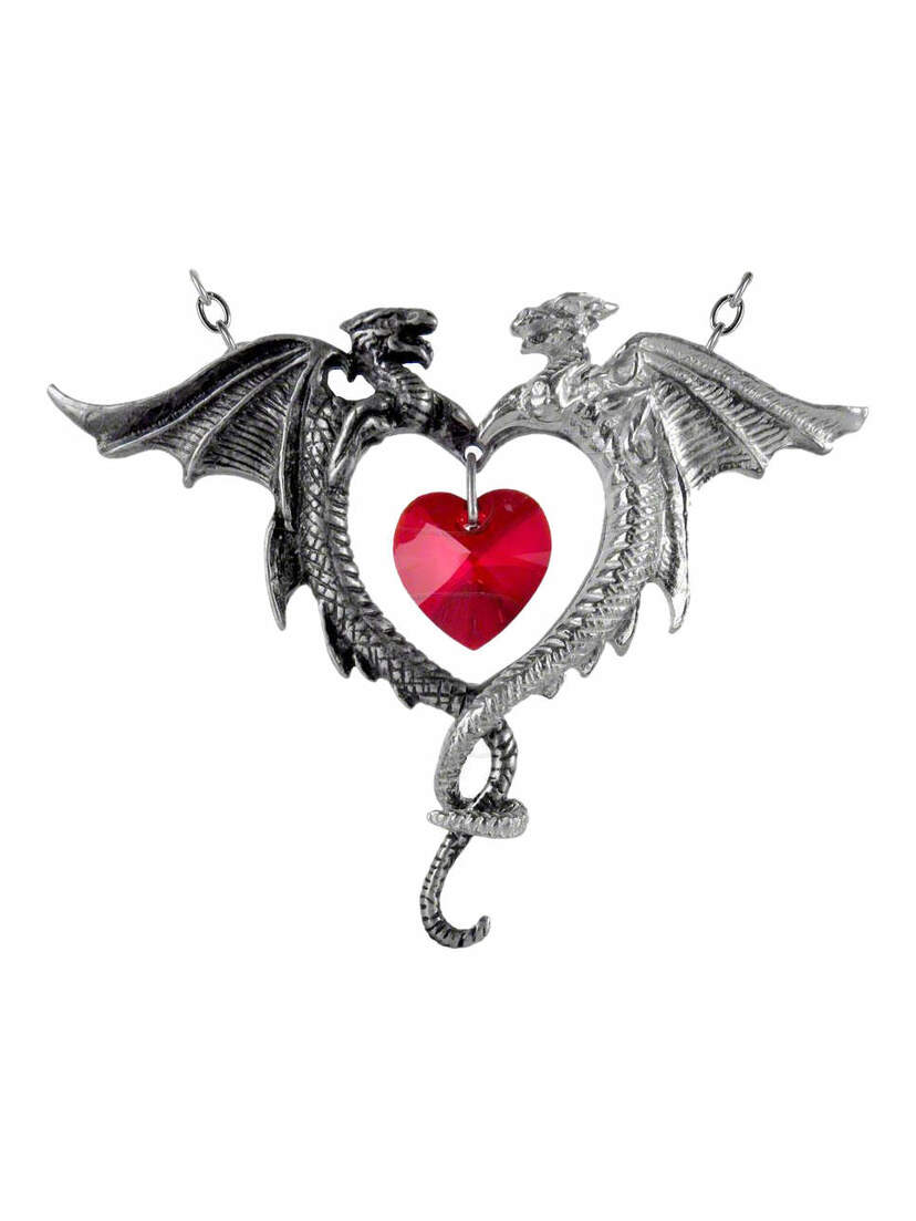 A silver pendant featuring two dragon figures surrounding a red heart-shaped gem.