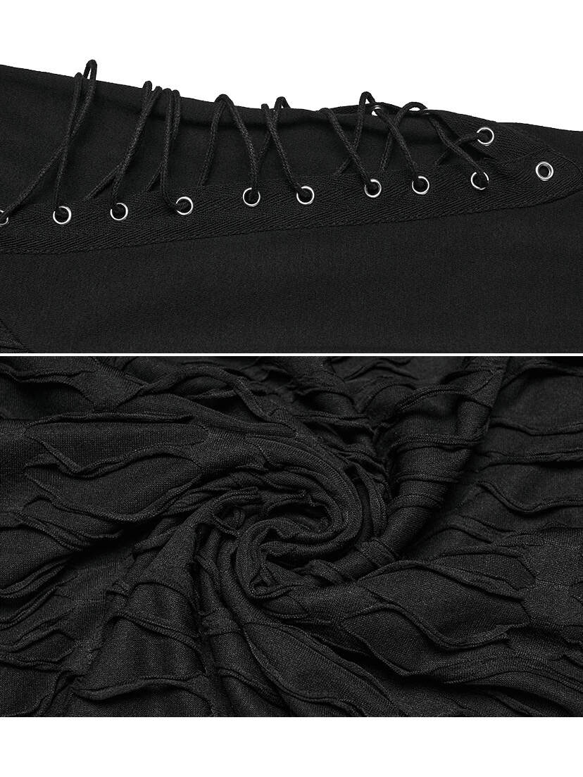 Black hoodie close-up with drawstring hood and gathered fabric detail