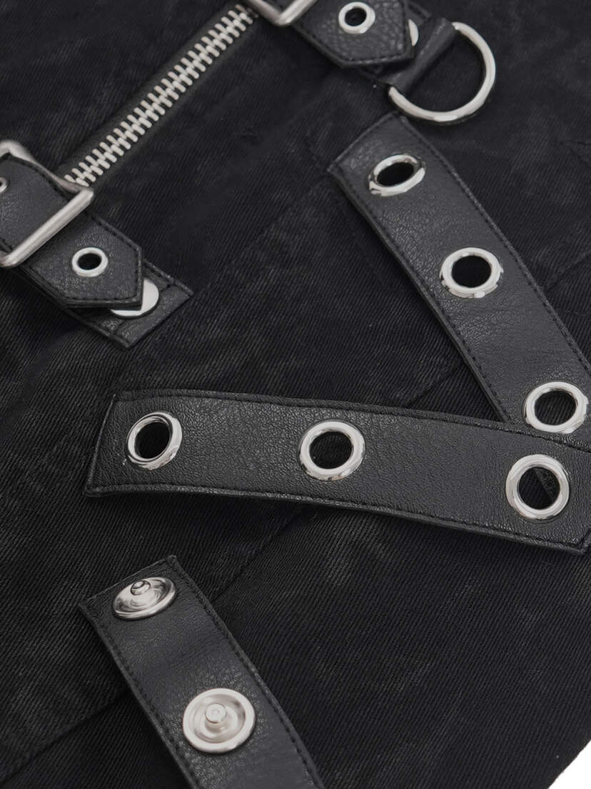 Badlands Strap Vest Close-up of the Badlands Strap Vest showing black straps with silver grommets and a zipper detail.