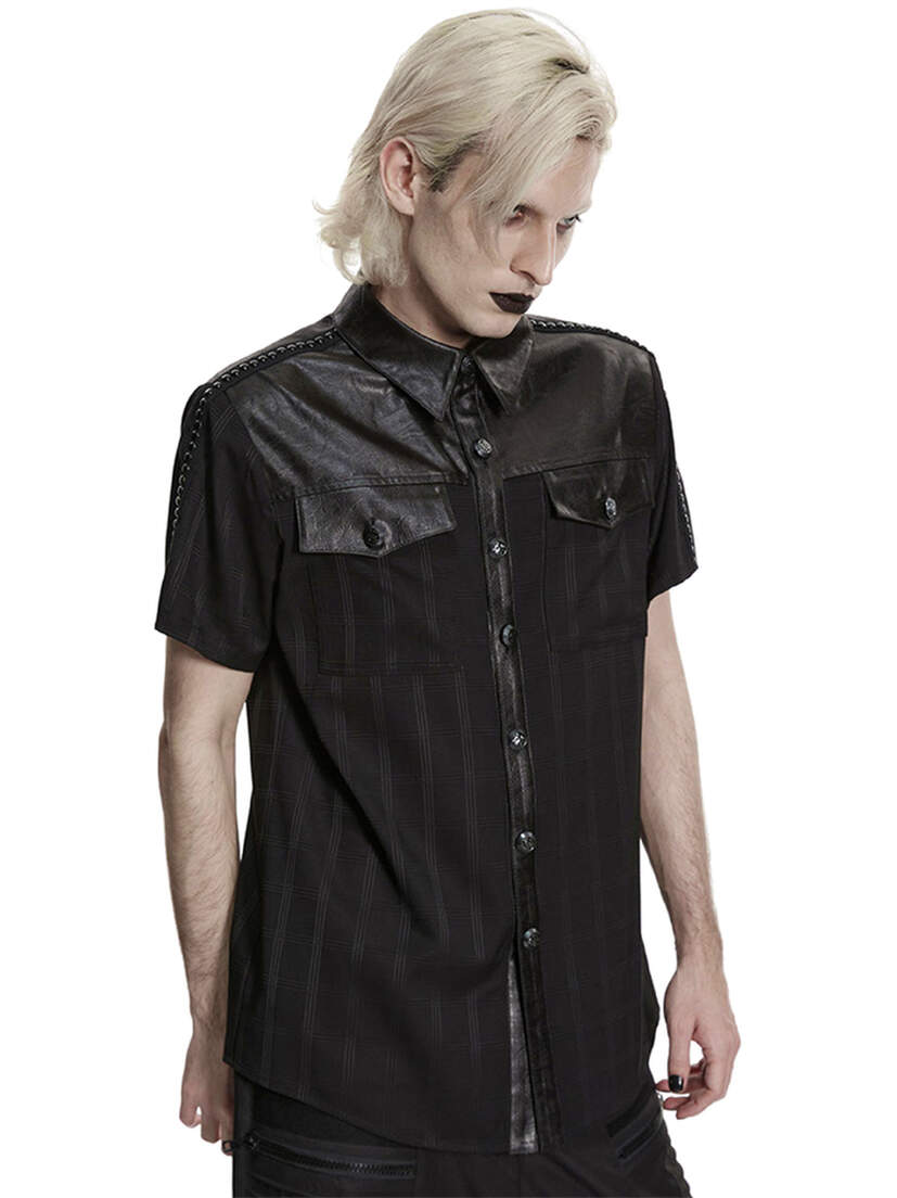 Blackout Plaid Punk Shirt Black plaid punk shirt with short sleeves and chest pockets on a model