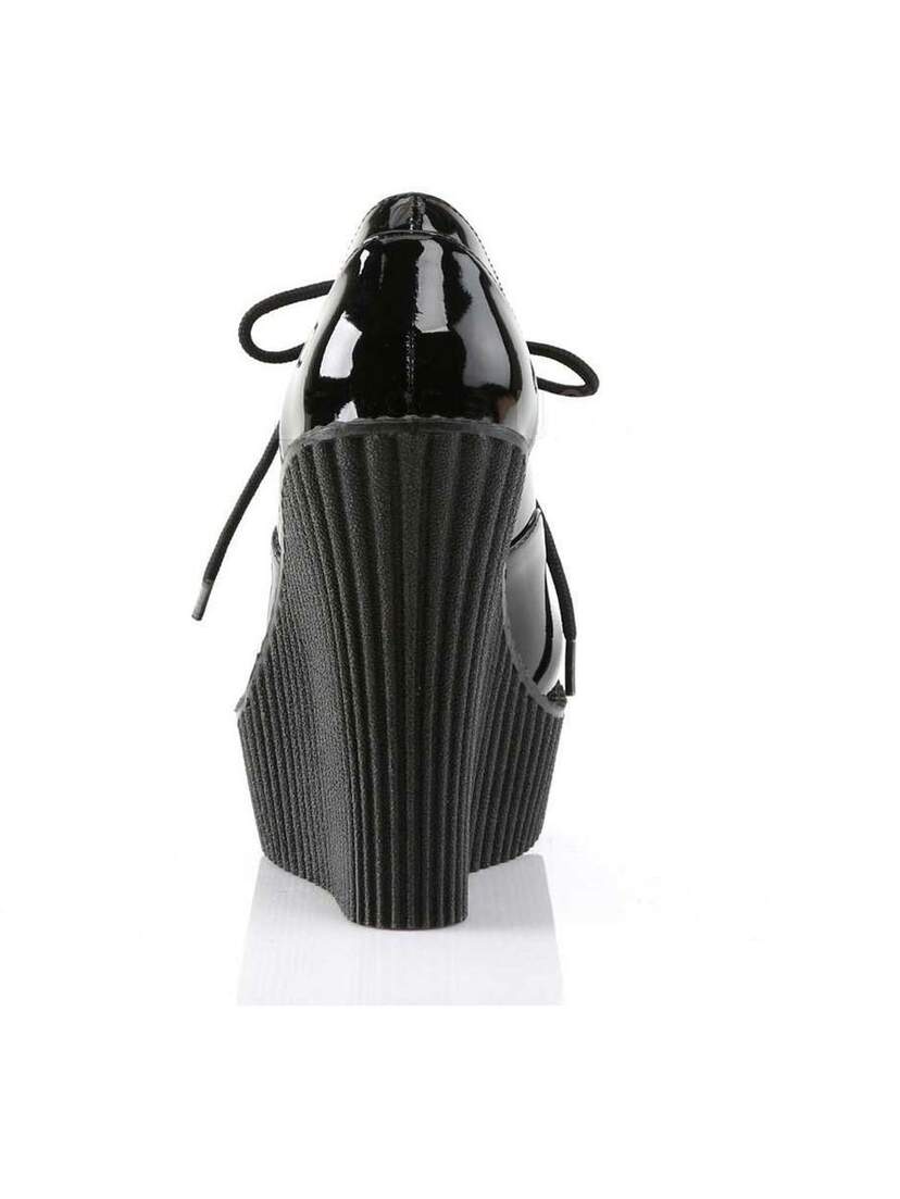 Rear view of CREEPER-302 black and white wedges with ribbed platform and glossy upper