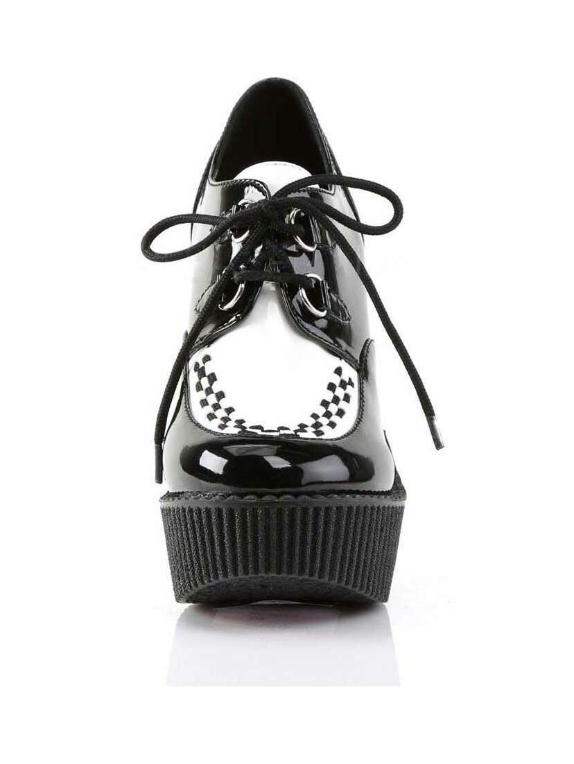 Front view of CREEPER-302 Black White Wedges with lace-up closure and checkered detail on toe
