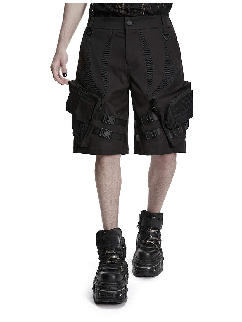 Darkcore Utility Cargo Shorts Black utility cargo shorts with side pockets worn with black boots on a model