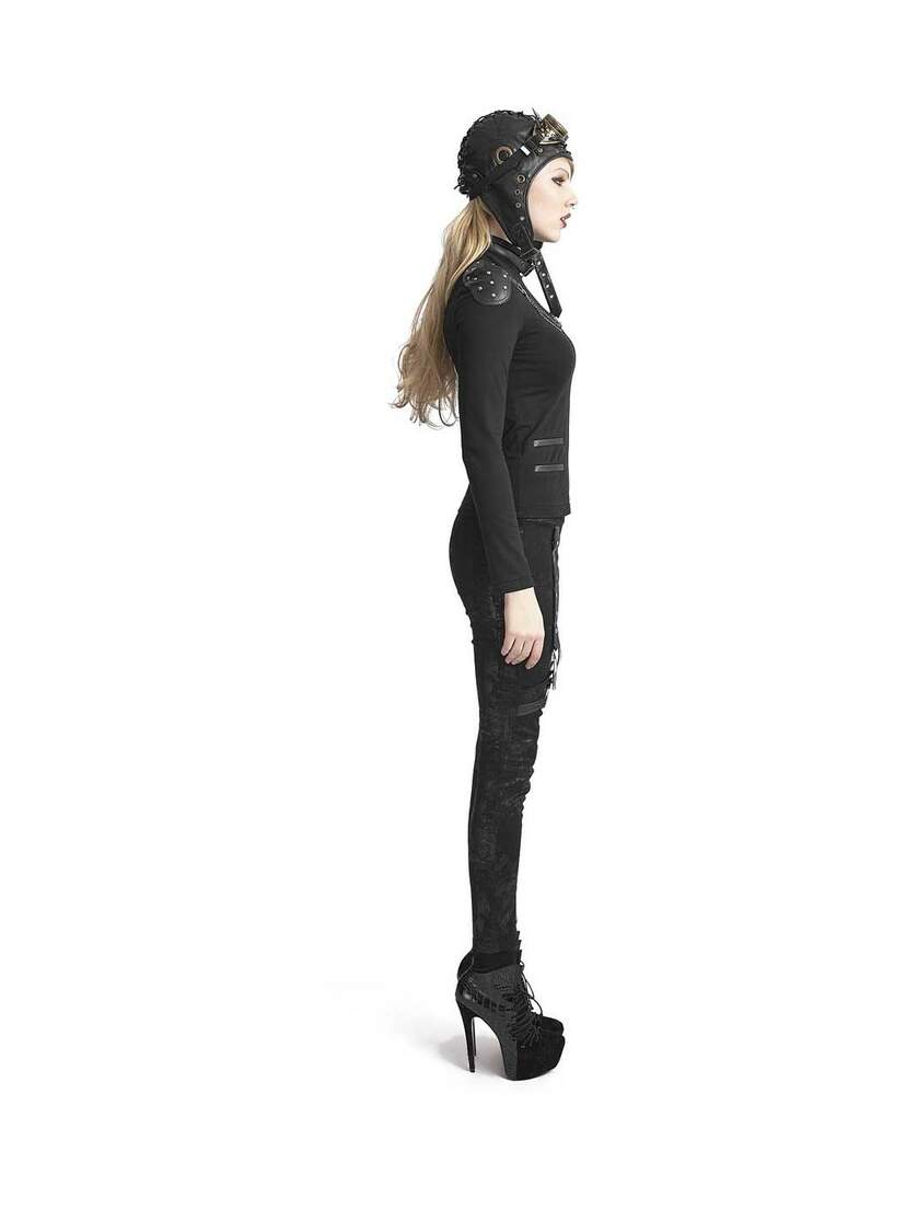 Side view of Kavita Faded Pants in black with subtle faded pattern, slim fit, and zip details