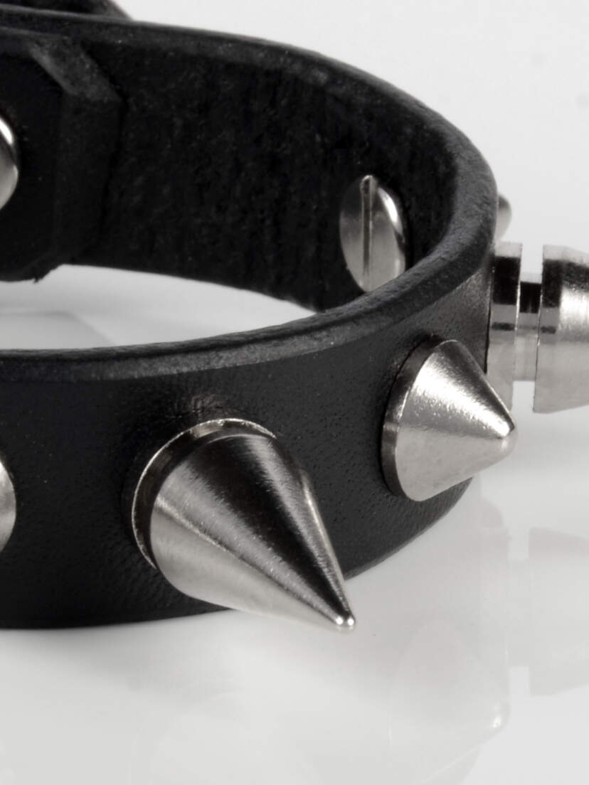 Mad-Dog Spiked Leather Wristband Black leather wristband with silver metal spikes and a buckle closure