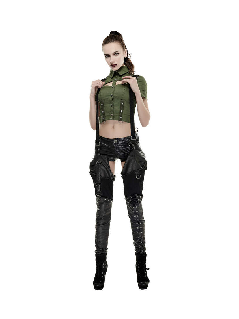 Front view of Nikita Detachable Pants in black with thigh cutouts, straps, and cargo pocket details