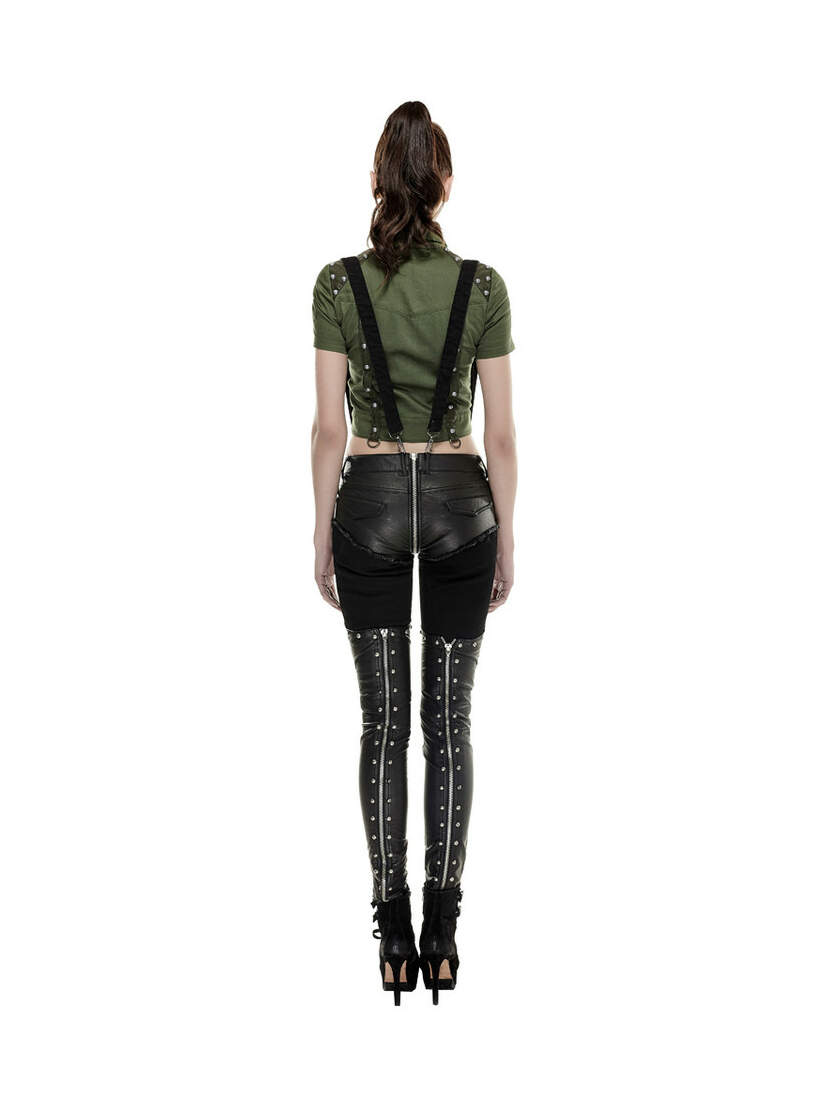 Back view of Nikita Detachable Pants in black with faux leather panels, studs, and detachable legs