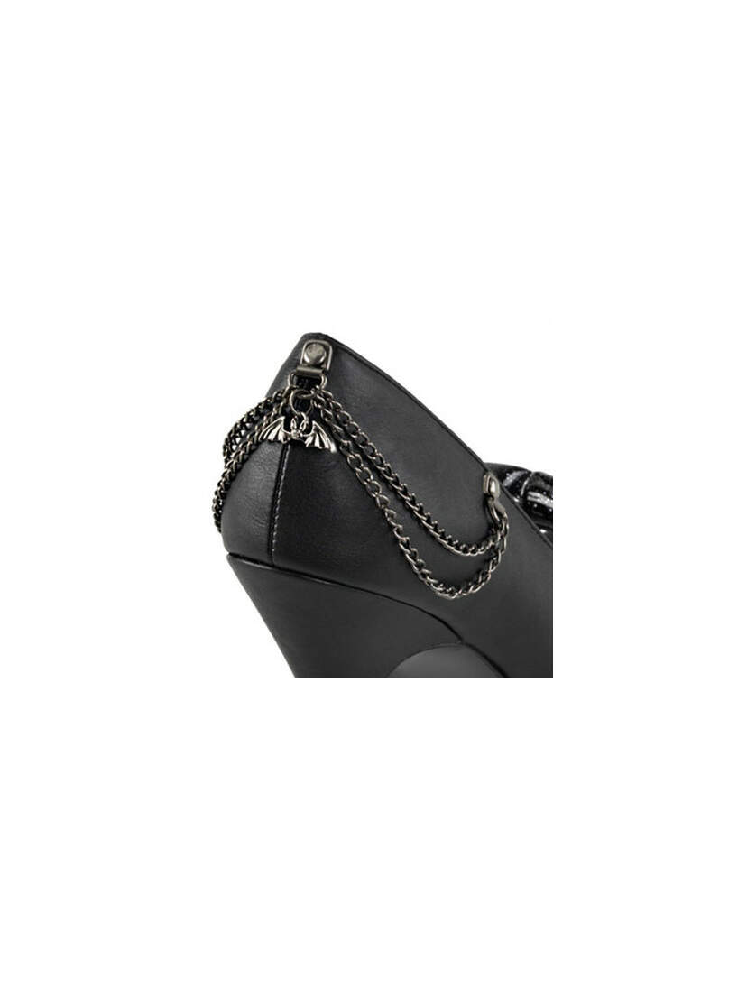 Close-up of PIXIE-16 Bat Glitter Heels black wedge heel with silver bat charm and chain detail