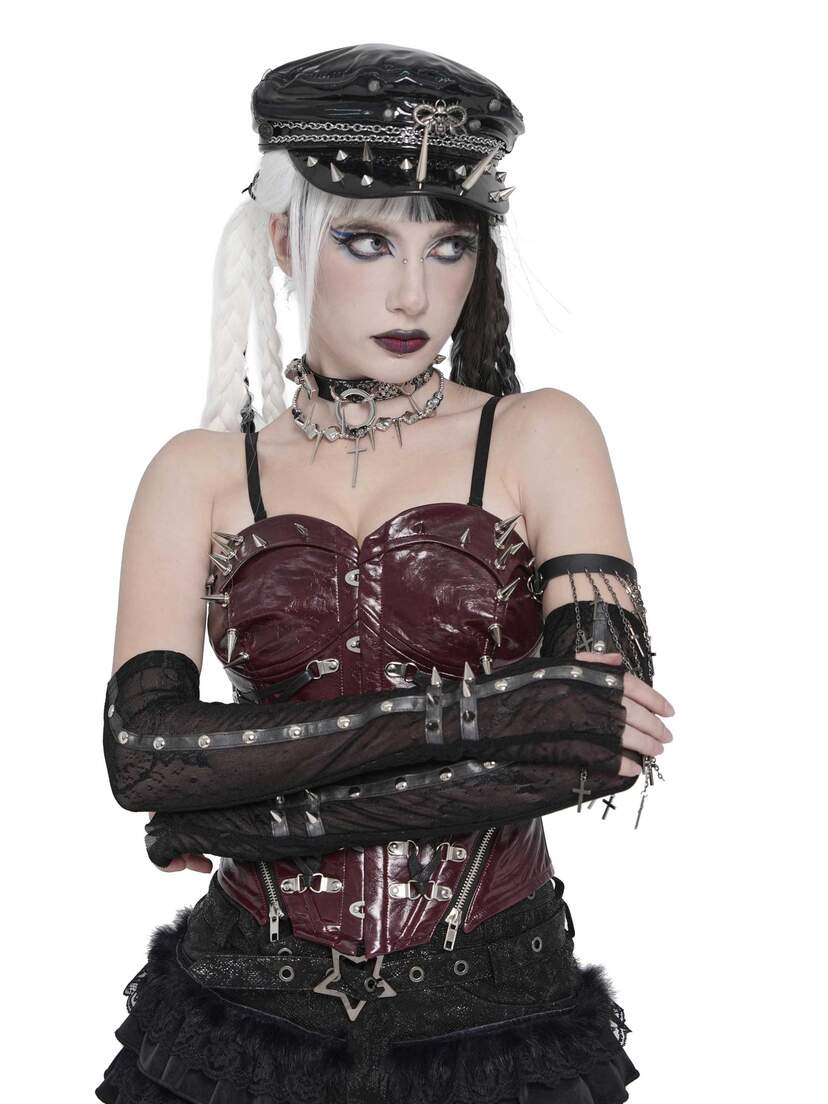Ravenfall Black Mesh Gloves Woman wearing black mesh gloves with strappy arms, a black hat, and dark gothic outfit.