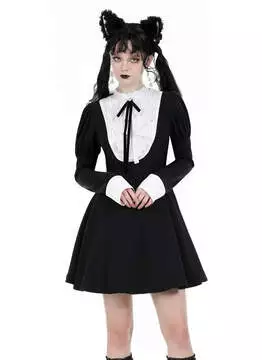 Front view of The Enigmatic Mrs. Ravendale Gothic Dress with black and white color scheme, bow detail, and long sleeves