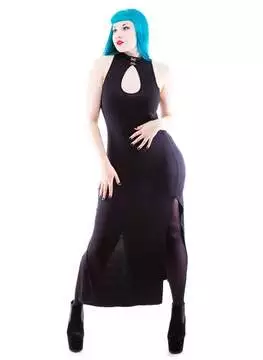 Full-length view of a woman in a black dress with a high slit, standing with hands on hips, blue hair, and black shoes