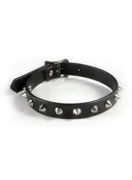 Black leather choker with cone spikes worn by a woman against a dark background