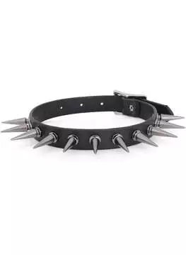 Close-up of gun-metal spike choker with multiple metal spikes on black vegan leather strap