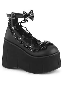 Front view of KERA-18 platform shoes in black vegan leather with buckle strap and bow detail