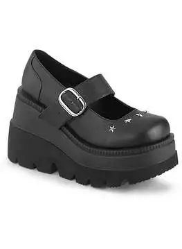 Side view of SHAKER-23 Star Platform Shoes in black vegan leather with star embellishments and chunky sole