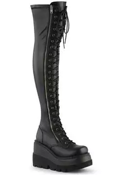 Side view of women's platform boot in black with lace-up front, chunky sole, and knee-high length