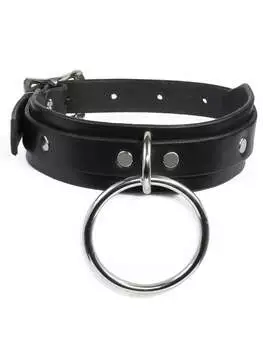 Close-up of a black leather choker with a large silver ring in the center
